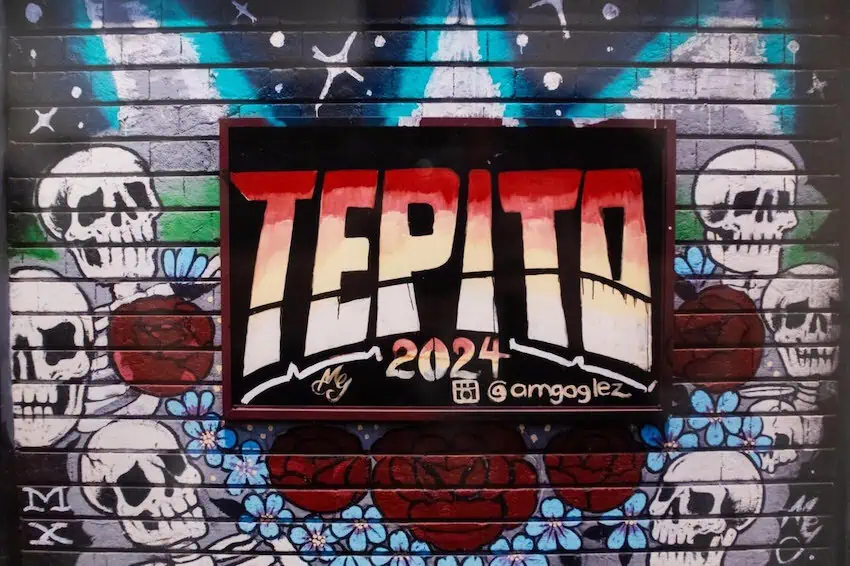 A graffiti mural that reads 'Tepito' surrounded by skulls