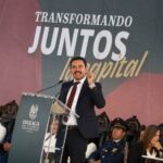 Oaxaca Mayor Raymundo Chagoya is saving his city’s water with people power Oaxaca mayor Raymundo Chagoya speaking at a podium with "Transformando Juntos la Capital" banner behind him as people sit in antique-style carved wooden chairs watching.