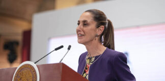 President Sheinbaum at the podium of her morning press conference