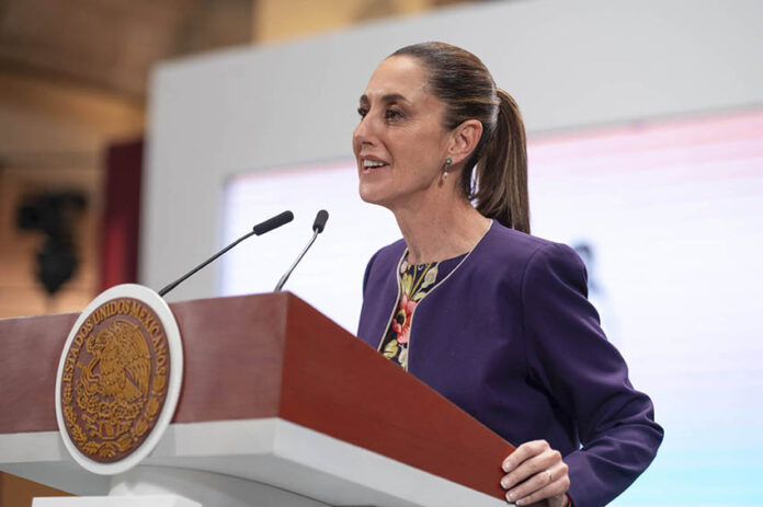 President Sheinbaum at the podium of her morning press conference