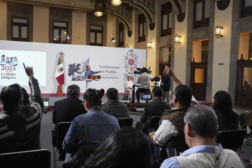 press members seated at press conference