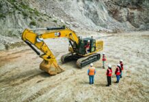 Southern Copper in talks with government to unlock US $10B+ in stalled mining investment Earth moving machne at mine site