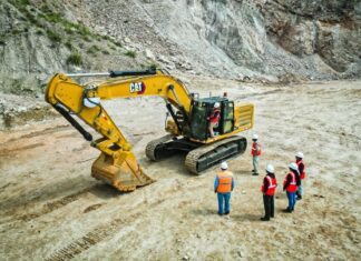 Southern Copper in talks with government to unlock US $10B+ in stalled mining investment Earth moving machne at mine site