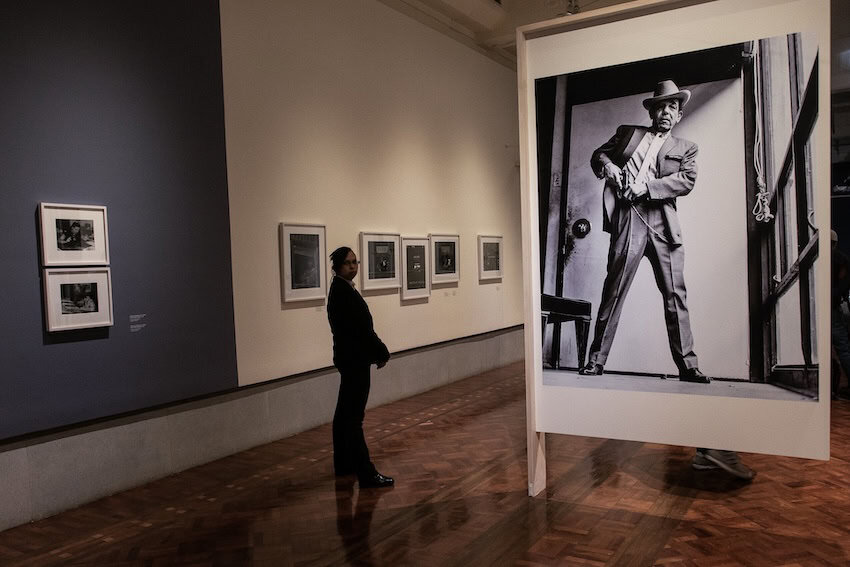 lone figure at an art exhibit