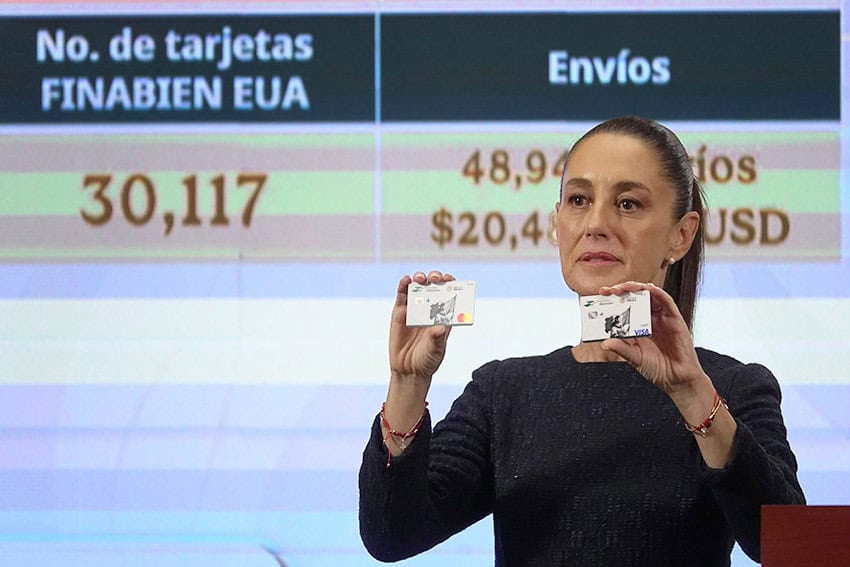Sheinbaum displays a Finabien bank card