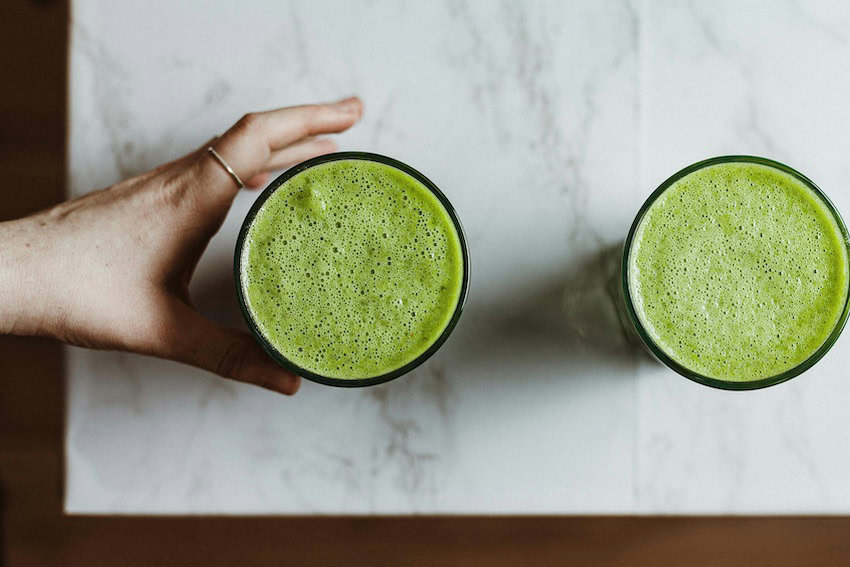 Two glasses of green juice