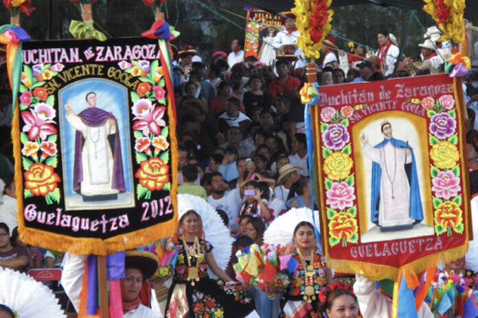 A street parade with colored banners