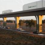 Startup aims to speed up trade with Monterrey-to-Texas automated freight corridor A rendering shows cargo containers moving along an automated freight corridor guideway above a highway