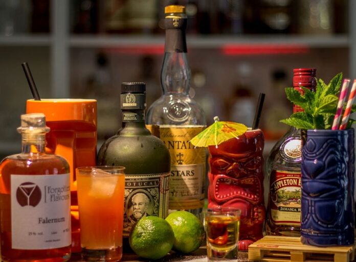 Bottles of liquor and cocktails on a great Mexico City cocktail bar.