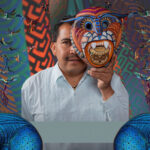 The artists behind Oaxaca’s global art fame: 10 visionaries you should know Artist Jacobo Ángeles holding a traditional Oaxacan folk art mask in front of his face.