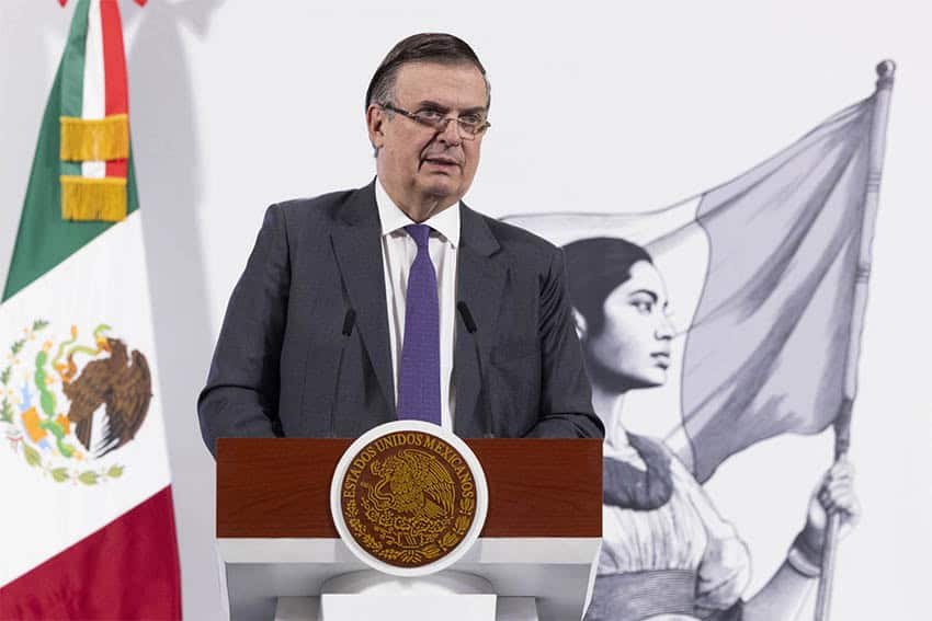 Economy Minister Marcelo Ebrard at a podium