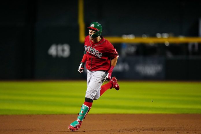 Meneses celebrates as he hits a second home run