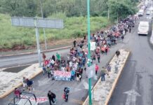 Migrant caravan of 300 departs Tapachula, but not for the US Migrants from Cuba, Haiti, Venezuela, Colombia, Peru and African and Central American countries departed Tapachula on foot early Wednesday