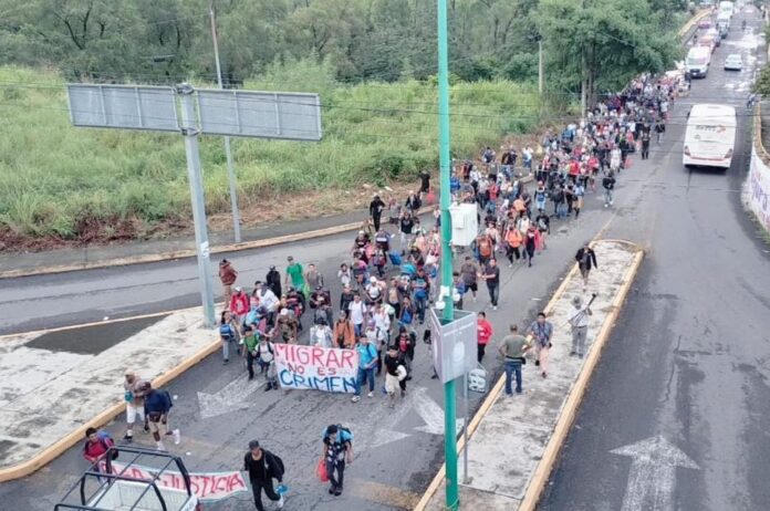 Migrants from Cuba, Haiti, Venezuela, Colombia, Peru and African and Central American countries departed Tapachula on foot early Wednesday