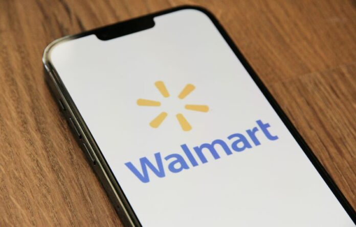 cel phone with image of Walmart logo