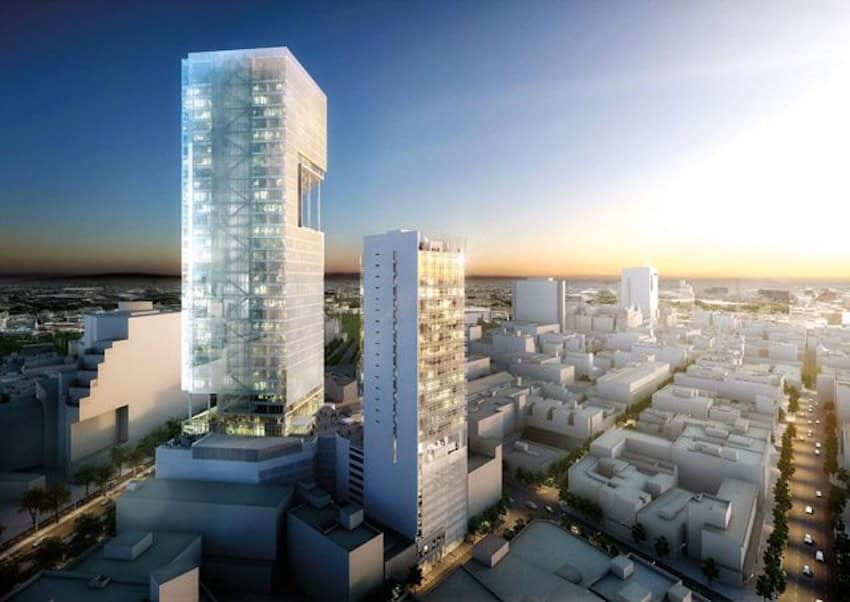 A white city skyscape featuring glass skyscraper towers