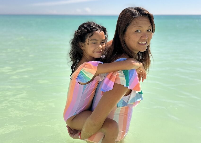 Nellie and her daughter in Playa del Carmen, one of the best beaches in Mexico