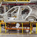Mexican auto industry rebounds in June with record production shell of a car on the assembly line