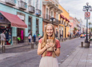 Maybe what Mexico needs is … more Americans? A perspective from our CEO A blond woman holds churros in a Mexican street