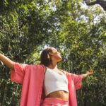 A woman with outstretched arms