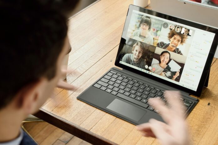 A man in a remote work meeting