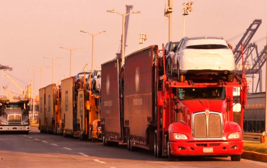 Trailers full of cars wait to be loaded onto ships at a dock in Veracruz